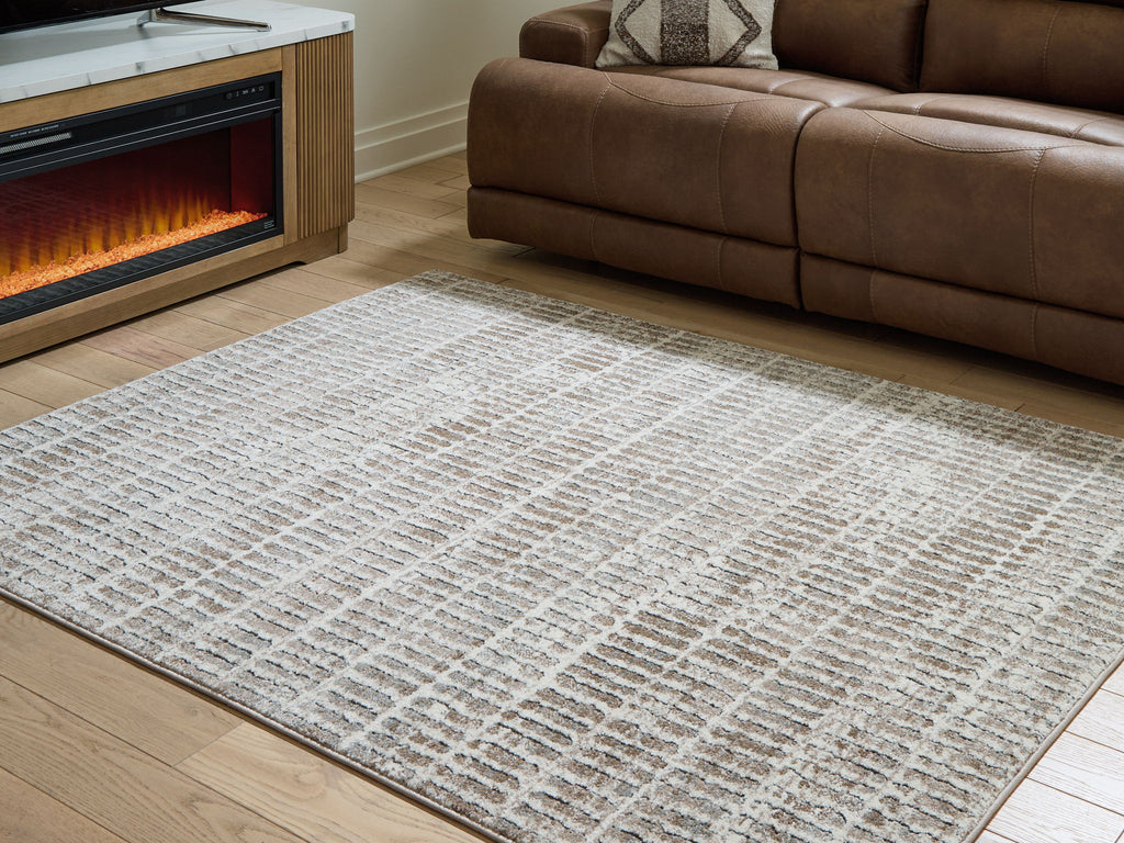 Gray area rug with textured grid pattern, rectangular