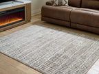 Gray area rug with textured grid pattern, rectangular