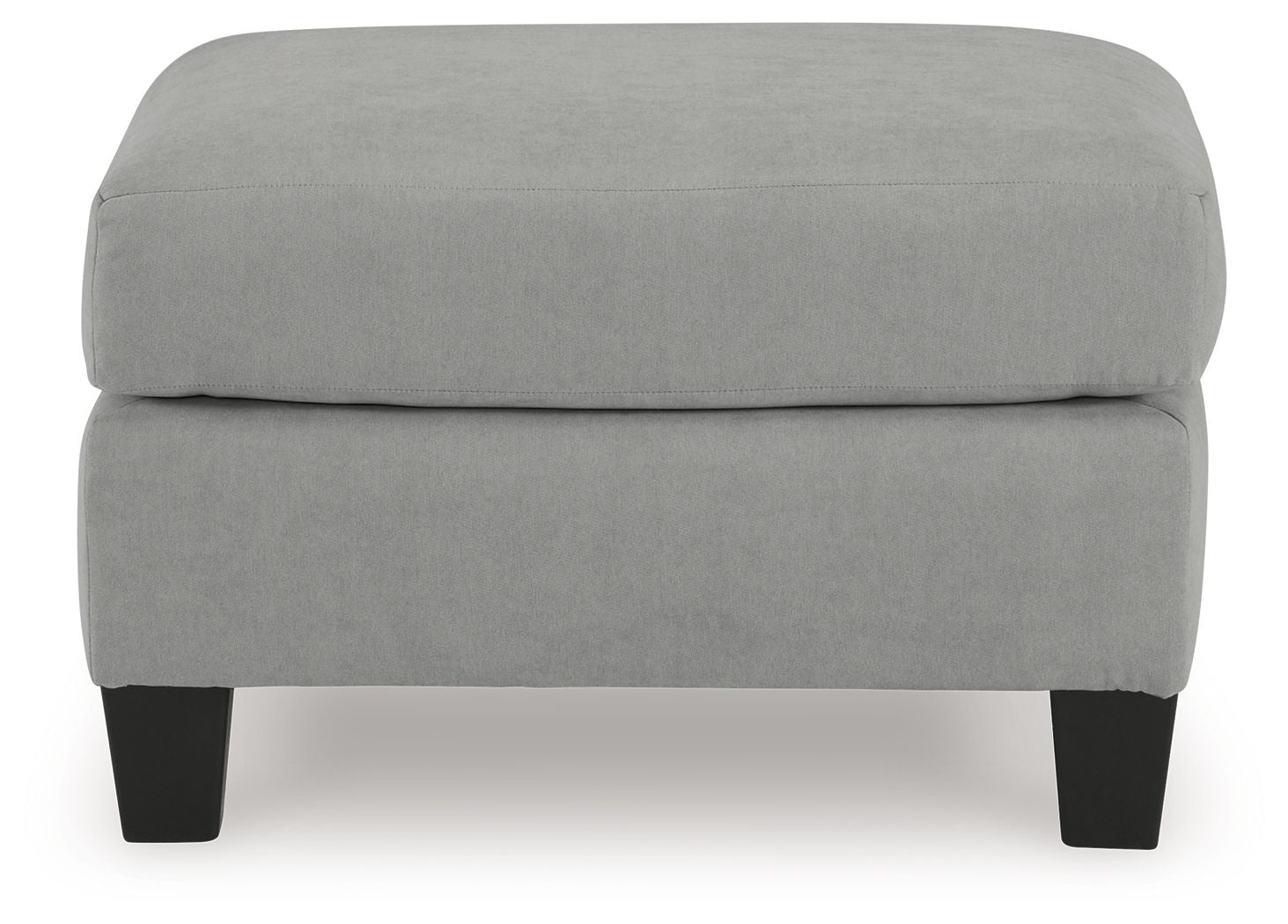 Gray upholstered ottoman with blocky profile and dark legs, front view