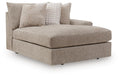 Linen-look corner chaise with rounded arms, tufted back cushion and two throw pillows