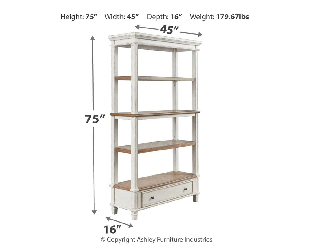 White wood bookcase with brown shelves and a front drawer, side view.