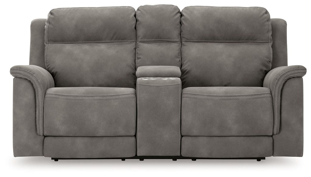 Dark gray reclining power loveseat with central console panel and padded armrests