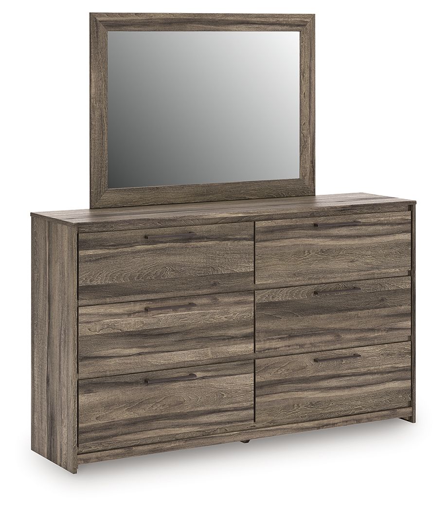 Dark brown low dresser with framed mirror and six drawers
