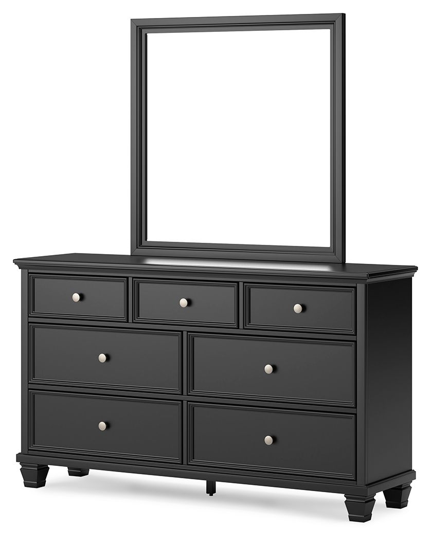 Black dresser with mirror frame and multiple drawers, silver round knobs, four corner feet