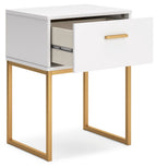 White night stand with open drawer showing interior, gold-tone bar handle.