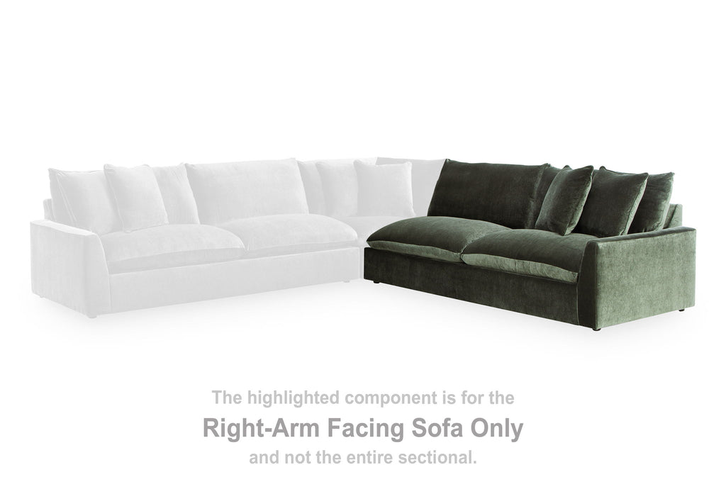 Jade green right-arm sectional sofa with chaise, plush back cushions and armrests