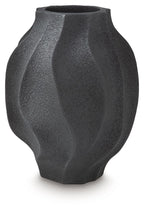 Black textured vase with asymmetrical fluted curves and round opening