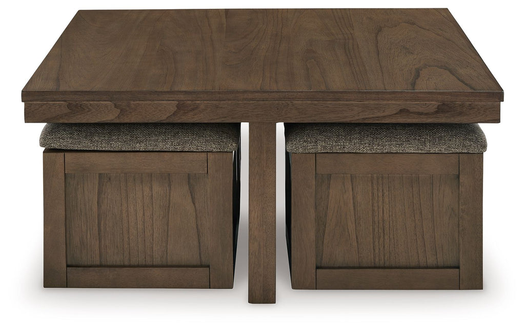 Brown square cocktail table with two matching stools and gray fabric upholstery.