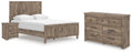Rusticott panel bed with light brown wood posts and two side drawers