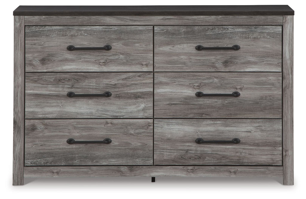 Dark gray dresser front with six drawers and metal bar handles