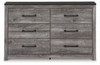 Dark gray dresser front with six drawers and metal bar handles