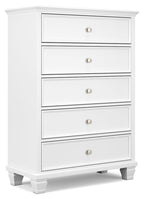White five-drawer chest with round knobs and decorative trim, on short legs.