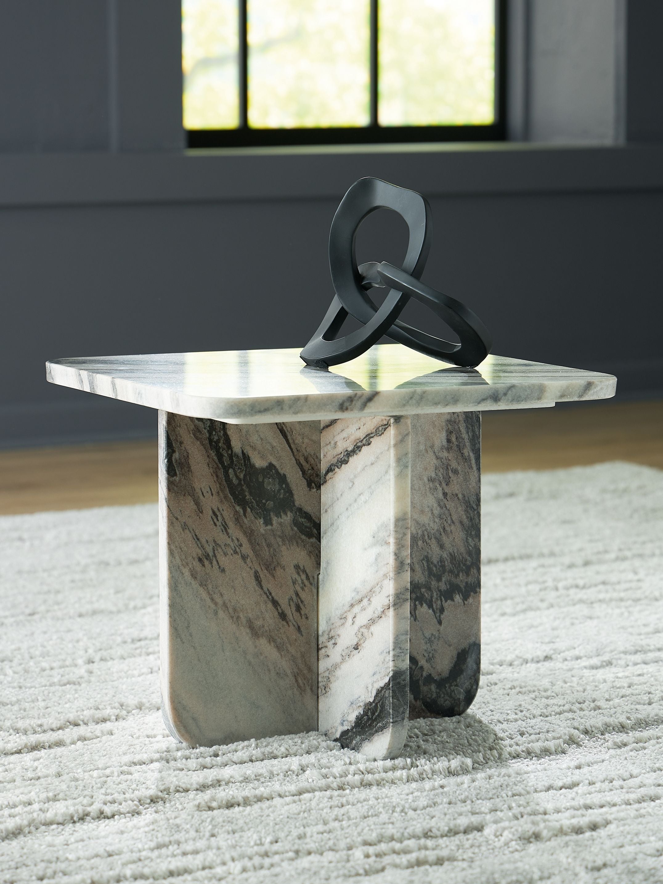 Accent cocktail table with marble-look top and cylindrical pedestal base