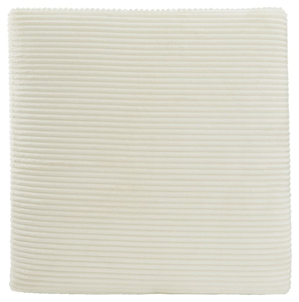 Beige square ottoman with ribbed fabric sides and flat padded top