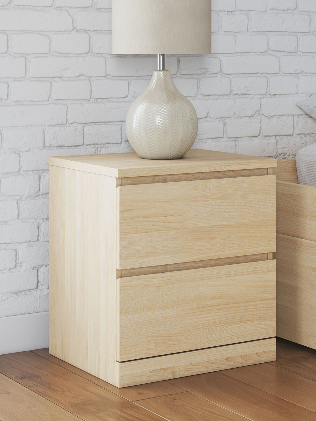 Light brown night stand with two drawers; minimalist rail pulls