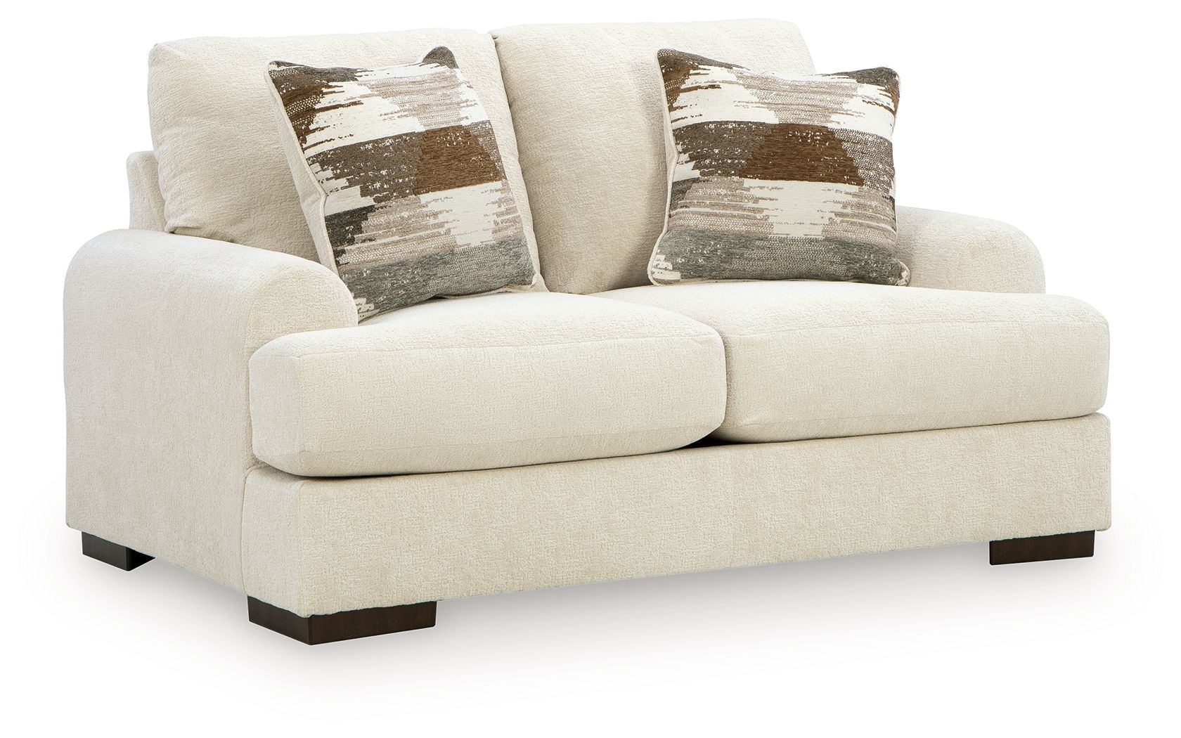 Light cream loveseat sofa with two seat cushions, square arms, dark legs, patterned pillows