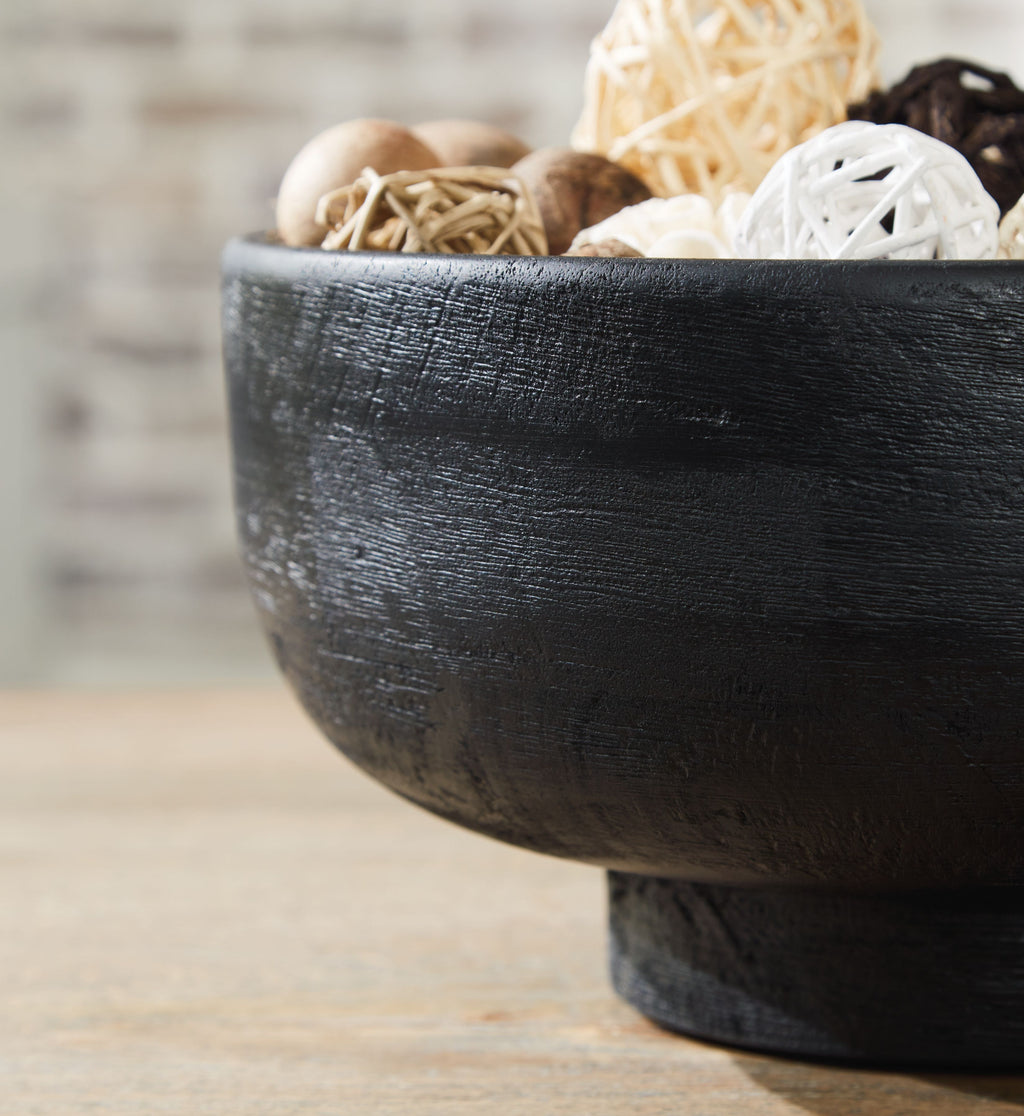 Brynnington black bowl, side view with rustic mottled texture and pedestal base