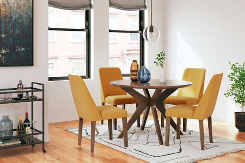 Dining table set with round wood table and four yellow upholstered chairs