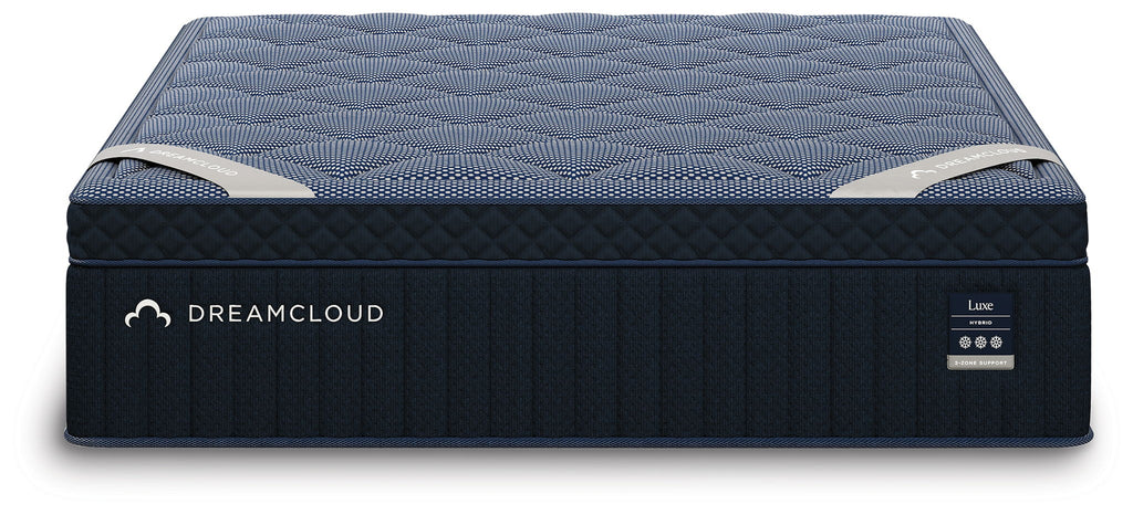 DreamCloud Luxe hybrid mattress with blue top surface and dark base sides