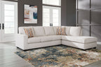 Light beige sectional sofa set with patterned pillows and corner chaise ottoman
