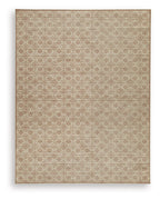 Area rug with light beige background, small red geometric motifs, and bordered edges