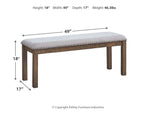 Beige upholstered bench with dark wood legs and round nailhead trim
