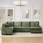 Green corduroy U-shaped sectional sofa with chaise, toss pillows, and ottoman side