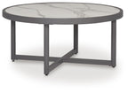 Gray round table with light marble-look top, X-style apron, and four legs