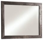 Bedroom mirror with gray rectangular frame and flat reflective glass