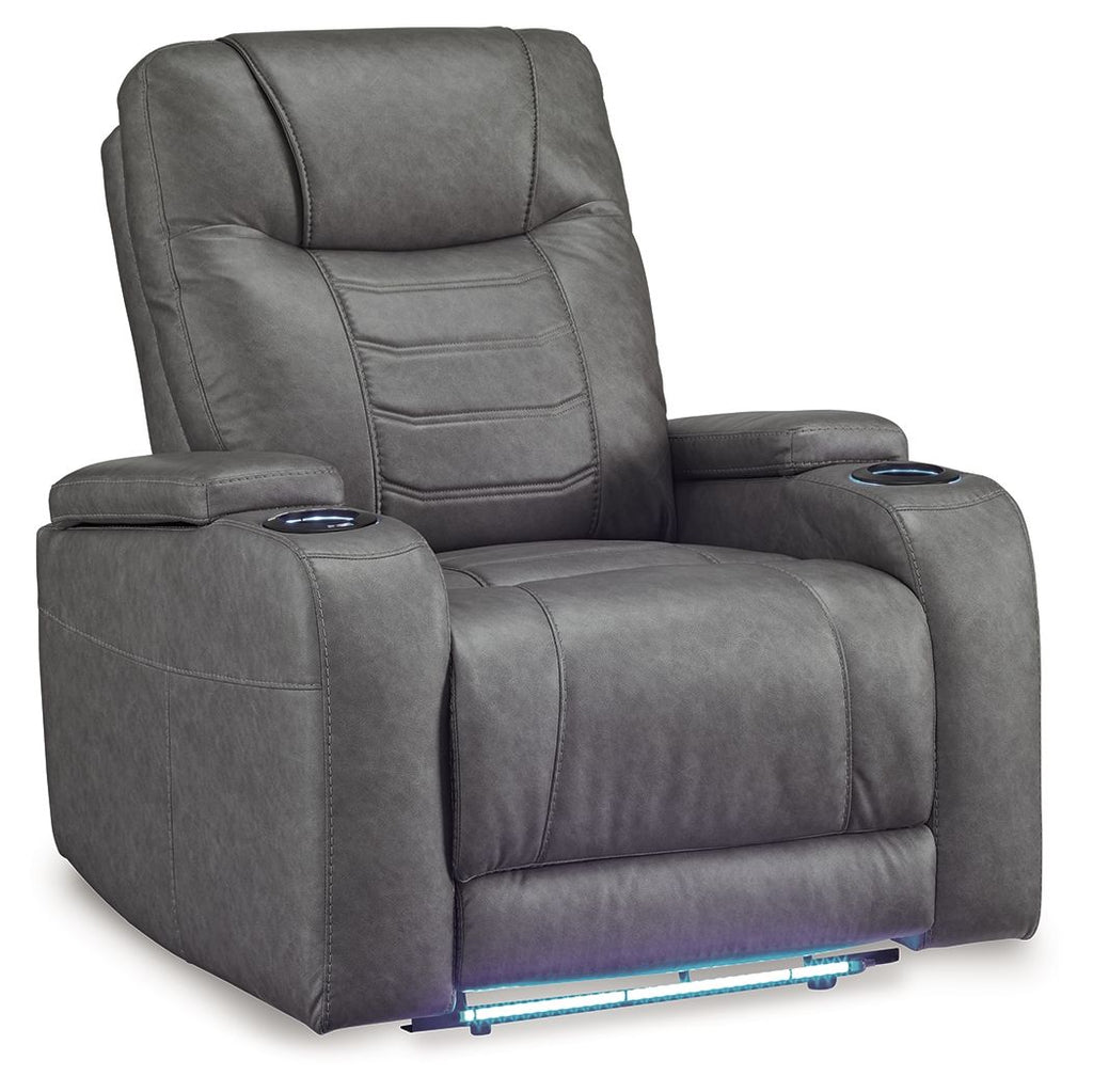 Slate gray power recliner with adjustable headrest, padded armrests, and wide recline seat