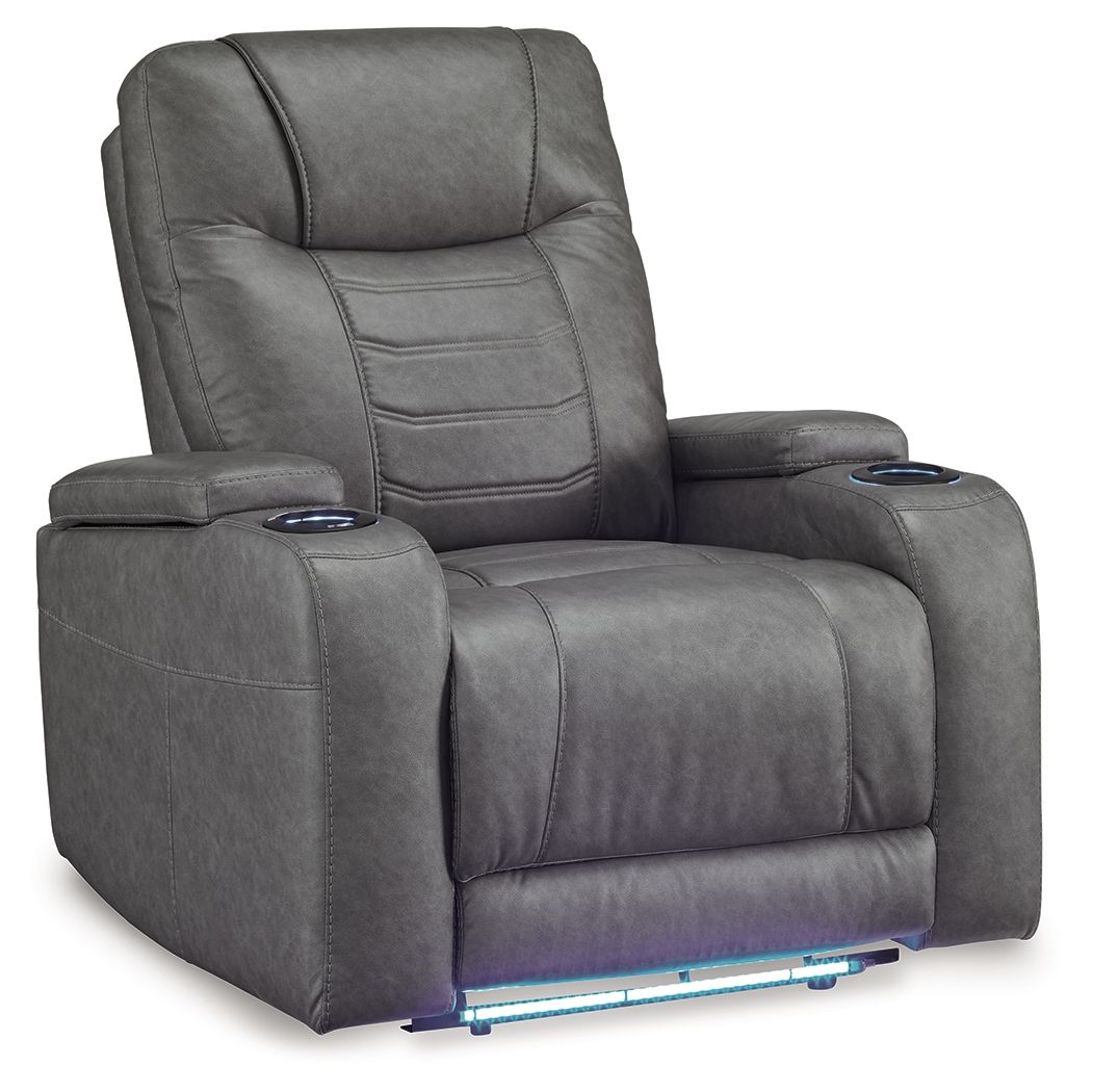 Slate gray power recliner with adjustable headrest, padded armrests, and wide recline seat