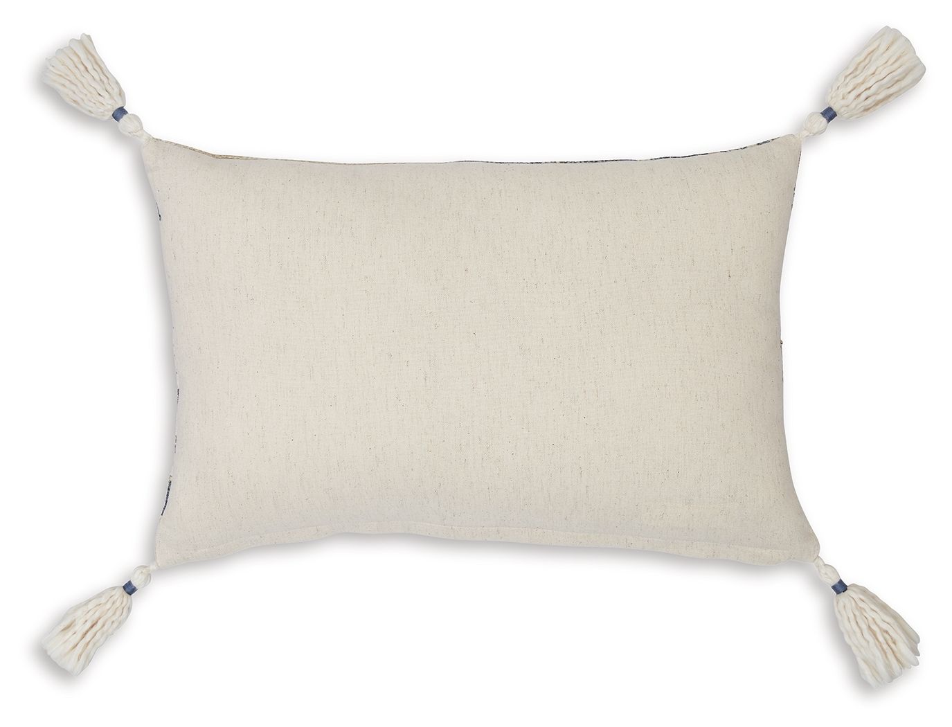 Light beige lumbar pillow with white tassel trim and smooth textured fabric