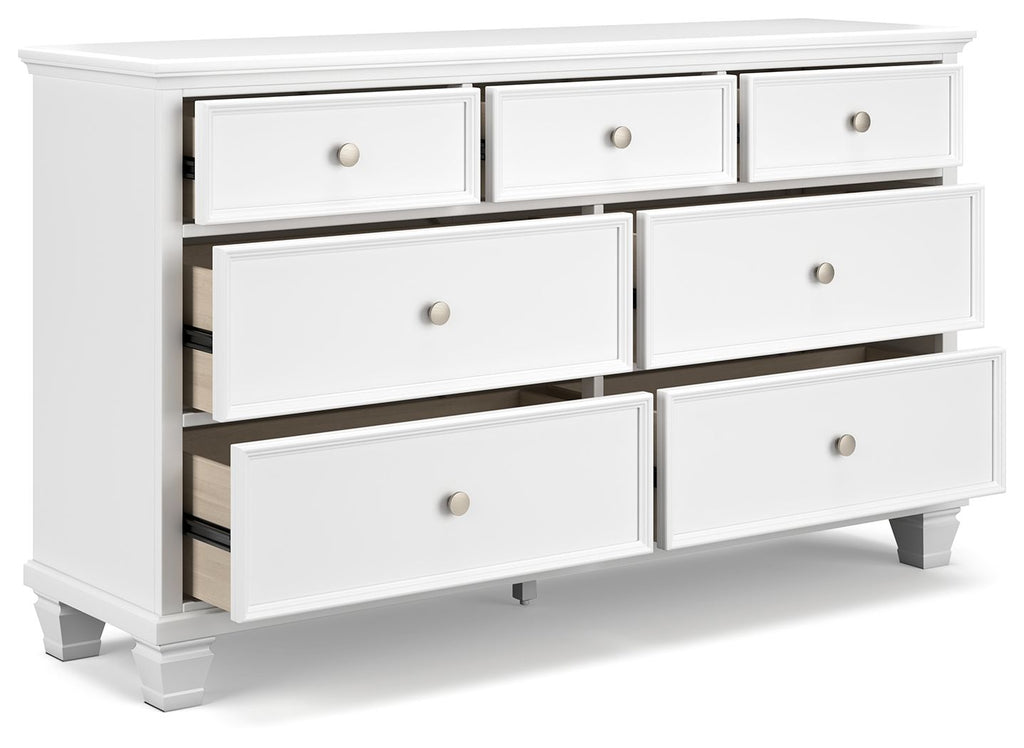 Fortman white dresser with partially open drawers, showing interiors and round knobs
