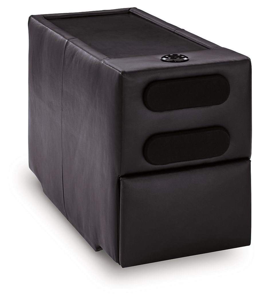 Black console with audio system, upholstered cube with two front speaker grilles