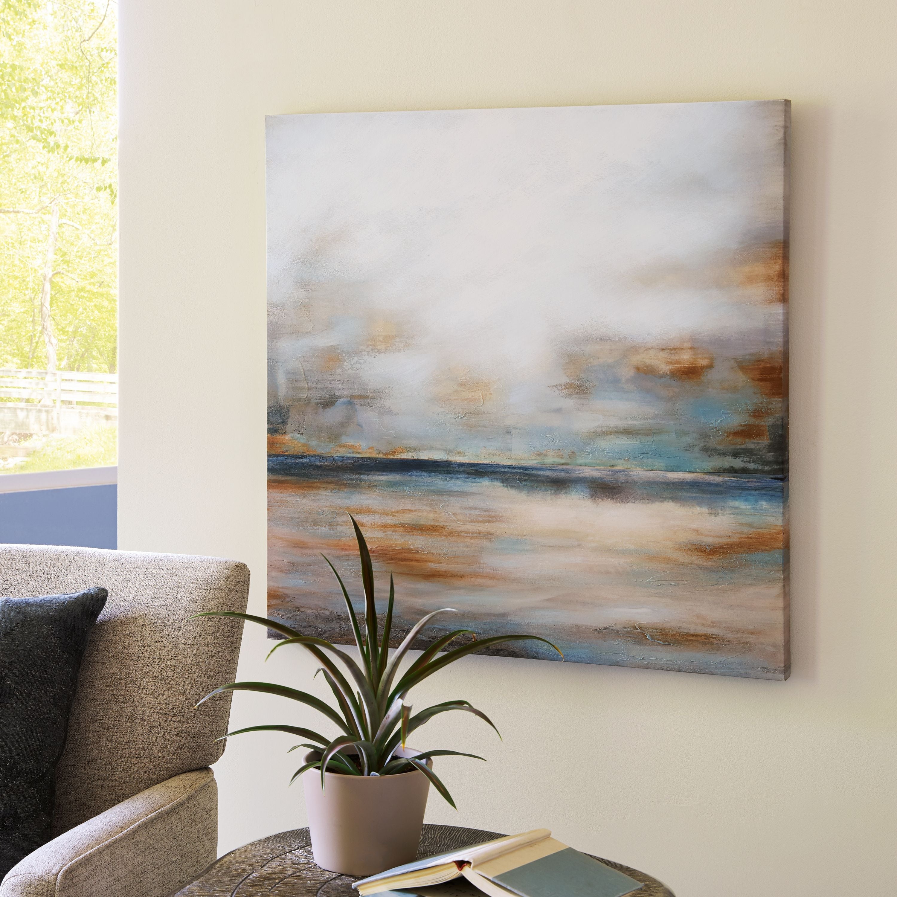 Framed abstract wall art with grey, gold, and teal blended horizon strokes