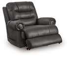Black leather-look power lift recliner with wide armrests and extended footrest