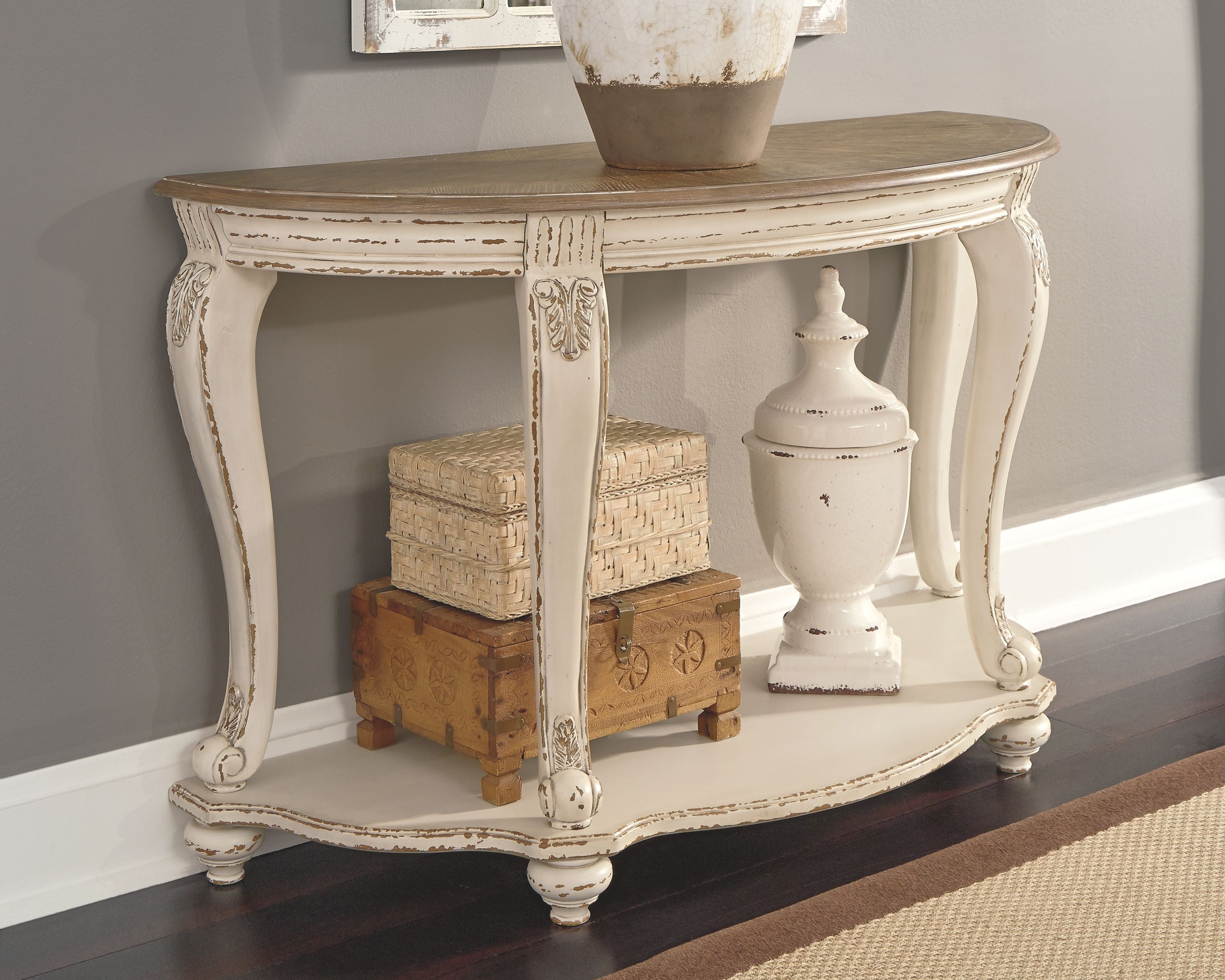 Distressed white sofa table with brown wood top and ornate cabriole legs
