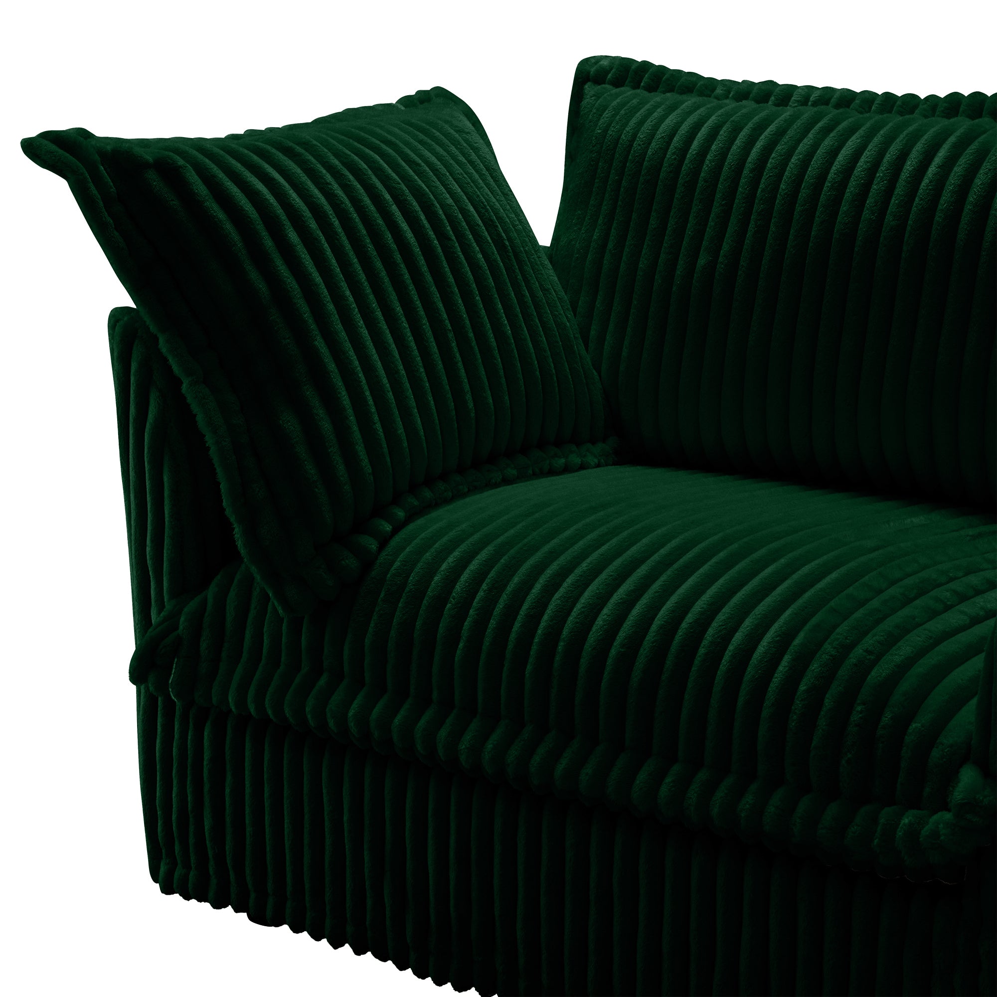 Green sectional armchair detail with ribbed upholstery and thick seat cushion