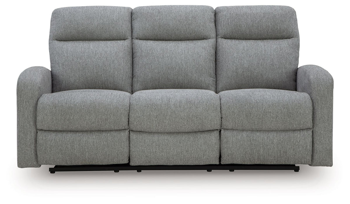 Light gray reclining sofa with three seat sections, padded arms and black base