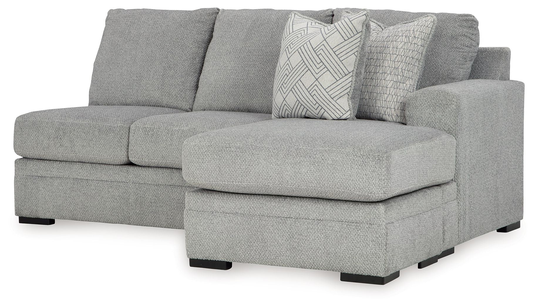 Upholstered grey sofa chaise with wide arm and back cushions