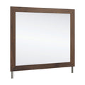 Janfyn bedroom mirror with dark brown wood frame and angled legs