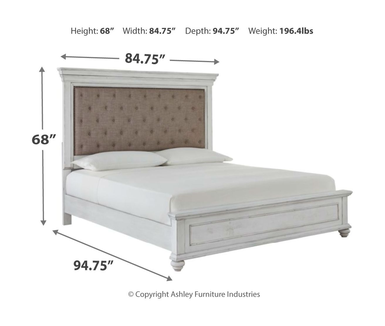 White upholstered platform bed with taupe button-tufted headboard and panel footboard.