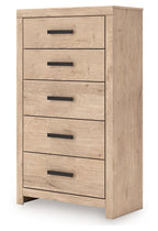 Five-drawer chest with light tan wood finish and five black bar pulls