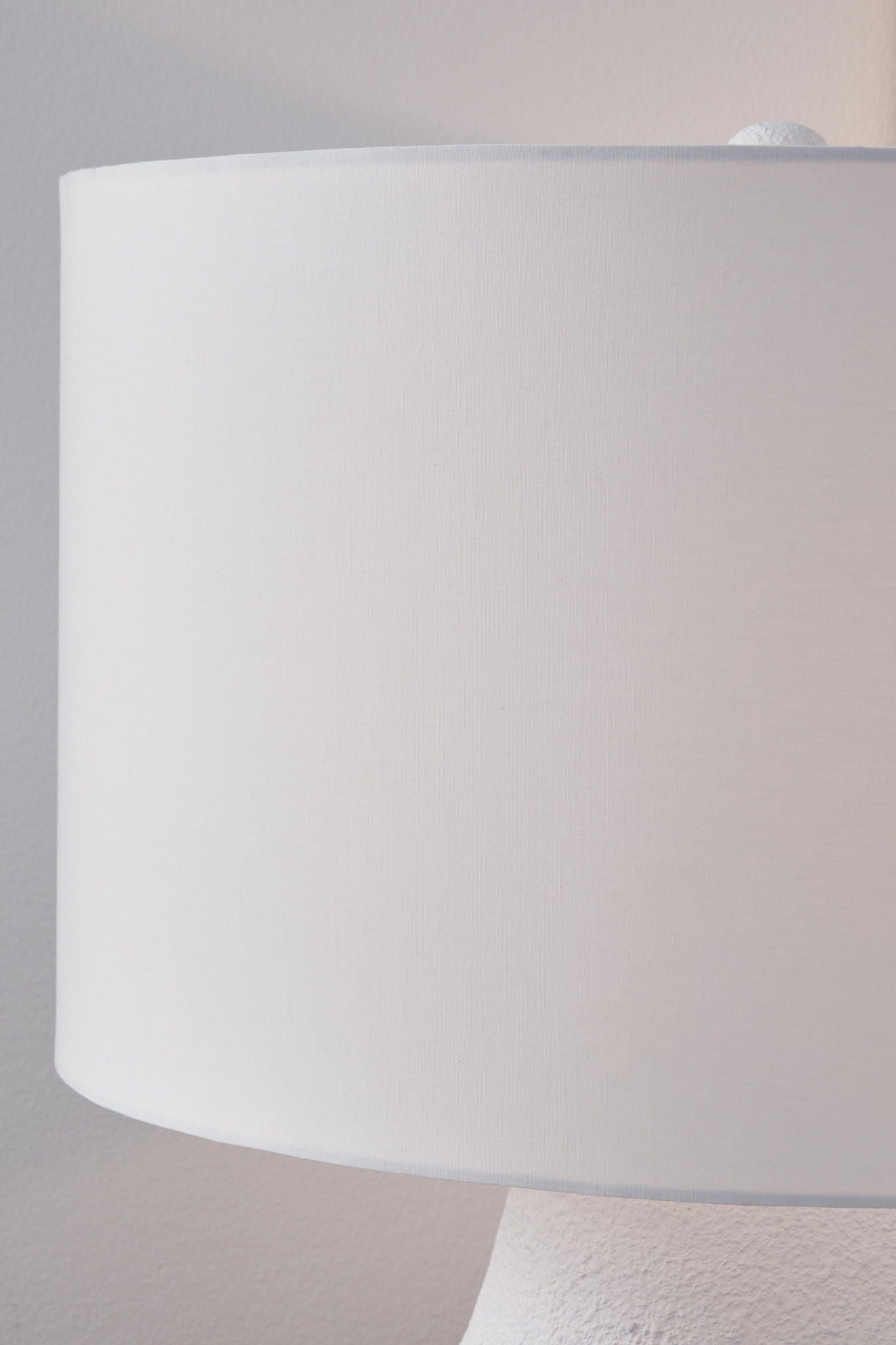 Metal table lamp shade in white fabric drum form