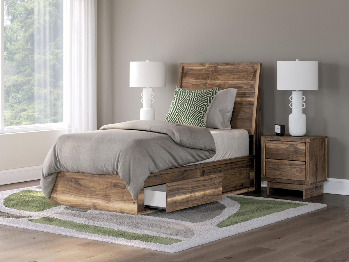 Dark brown panel bed with storage drawers, white bedding and pillows