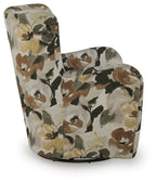 Floral swivel accent chair with rounded arms; beige fabric with dark brown and black flowers