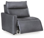 Dark gray upholstered power recliner with extended footrest and tall back