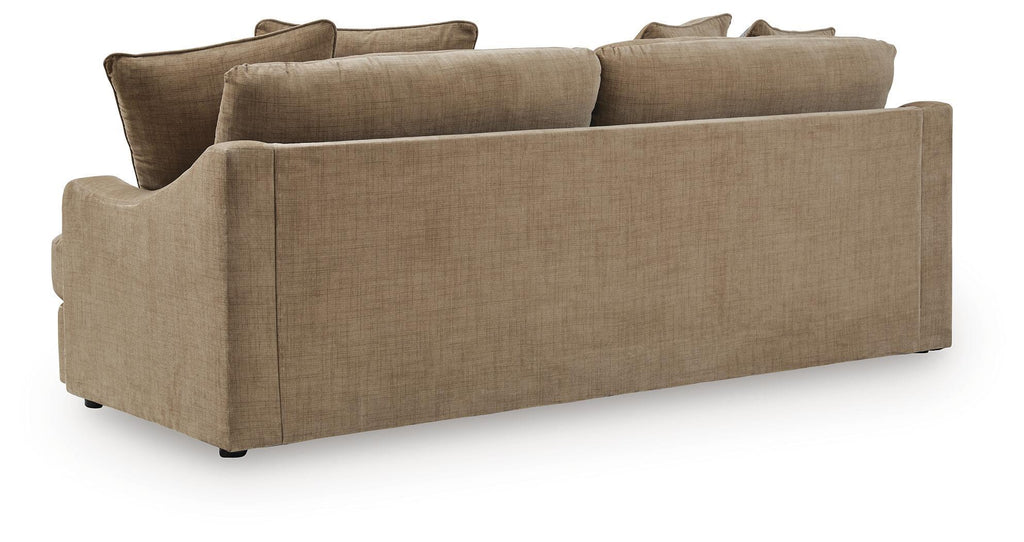 Sofa with light beige upholstery, low arms, and squared back cushions