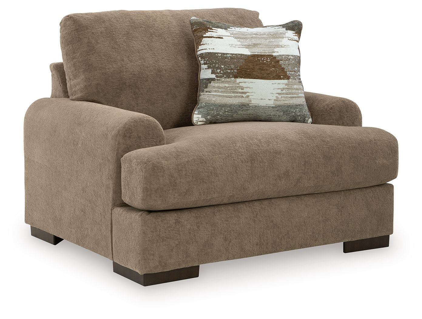 Armchair in light brown fabric with thick seat and back, plus a patterned throw pillow