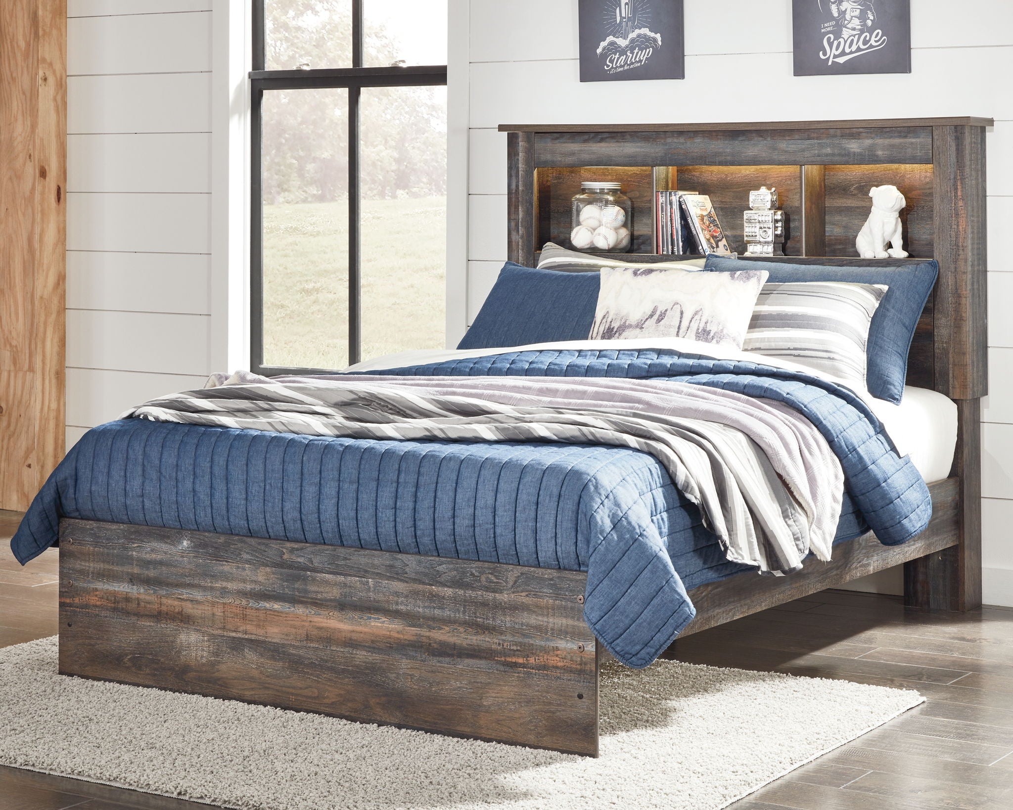 Panel bookcase bed with under-drawer storage, dark wood frame, blue bedding, open back shelf